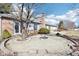 Well landscaped backyard with firepit and mature trees. A perfect backyard for entertaining at 10709 E County Road 100 N, Indianapolis, IN 46234