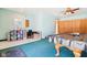 Large basement featuring a pool table, storage containers, and open layout at 10709 E County Road 100 N, Indianapolis, IN 46234
