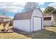 Well-maintained detached garage with ample storage space and a functional design at 10709 E County Road 100 N, Indianapolis, IN 46234