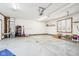 The garage provides ample storage space and features a modern heating and cooling system at 10709 E County Road 100 N, Indianapolis, IN 46234