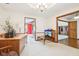 Office featuring a chandelier and views of the rest of the house at 10709 E County Road 100 N, Indianapolis, IN 46234
