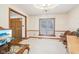 Large office featuring a large window and adjacent rooms at 10709 E County Road 100 N, Indianapolis, IN 46234