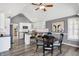 Bright open concept kitchen with a center island, white cabinets, and a casual dining area at 10896 Fairwoods Dr, Fishers, IN 46037