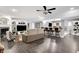 Basement living space with built-in shelving, fireplace, and bar area, perfect for entertaining at 10896 Fairwoods Dr, Fishers, IN 46037