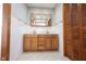 Spacious double vanity bathroom features tile floors and a paneled linen closet at 118 Beechwood Dr, Westfield, IN 46074
