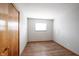 Bedroom features hardwood floors, a closet, and a window at 118 Beechwood Dr, Westfield, IN 46074