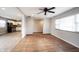 Bright living area with hardwood floors adjacent to a kitchen with modern appliances at 118 Beechwood Dr, Westfield, IN 46074