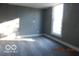 Neutral bedroom with natural light, featuring carpeted floors at 1311 E Hines St, Muncie, IN 47303