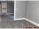 Living room featuring neutral walls and view into the Kitchen at 1311 E Hines St, Muncie, IN 47303