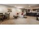 Spacious basement features a stylish bar, comfortable seating area, and ample space for recreation at 14297 Matt St, Carmel, IN 46033