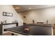 Basement game area featuring a ping pong table and accent furnishings; ample space for recreation at 14297 Matt St, Carmel, IN 46033