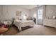 Charming bedroom featuring a cozy swing chair and comfortable bed, perfect for relaxation at 14297 Matt St, Carmel, IN 46033