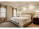 Inviting bedroom with neutral décor, large windows, and a comfortable bed offers a relaxing retreat at 14297 Matt St, Carmel, IN 46033