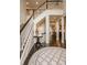 Spacious foyer with staircase, hardwood floors, and entry to adjacent rooms at 14297 Matt St, Carmel, IN 46033