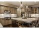 Gourmet kitchen features a large island, stainless steel appliances, and ample counter space at 14297 Matt St, Carmel, IN 46033