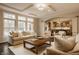Spacious living room with tray ceiling and open view to the kitchen at 14297 Matt St, Carmel, IN 46033
