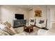 Cozy living room with stylish furniture, entertainment center, and neutral color palette at 14297 Matt St, Carmel, IN 46033