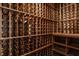 Custom wine cellar features extensive wooden racking to properly store wine bottles at 14297 Matt St, Carmel, IN 46033