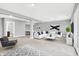 Spacious finished basement with ample seating, offering additional living or entertainment space at 14474 Treasure Creek Ln, Fishers, IN 46038