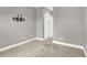 Bedroom boasts neutral paint, carpet, and a TV mount for entertainment and double closets at 14474 Treasure Creek Ln, Fishers, IN 46038