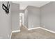 Bedroom boasts neutral paint, carpet, and a TV mount for entertainment at 14474 Treasure Creek Ln, Fishers, IN 46038
