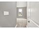 View into a bright bedroom with neutral paint, carpet, and a large window at 14474 Treasure Creek Ln, Fishers, IN 46038