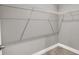 Walk-in closet with ample storage space and wire shelving for organization at 14474 Treasure Creek Ln, Fishers, IN 46038