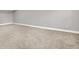 Spacious room with neutral carpeting and grey walls with white trim at 14474 Treasure Creek Ln, Fishers, IN 46038