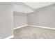 View of room with neutral carpeting, grey walls, and white trim at 14474 Treasure Creek Ln, Fishers, IN 46038