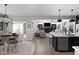 Inviting open-concept space connecting kitchen, dining, and living areas for easy interaction at 15675 Woodford Dr, Westfield, IN 46074