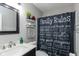 Bathroom featuring a vanity, mirror, decorative shower curtain and shelving at 160 Tracy Ridge Blvd, Whiteland, IN 46184