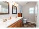 Bathroom with double sink vanity and stylish tile flooring at 160 Tracy Ridge Blvd, Whiteland, IN 46184