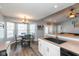 Bright kitchen with an eat-in area and large windows overlooking the backyard at 160 Tracy Ridge Blvd, Whiteland, IN 46184
