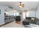 Open concept living room with modern decor, vaulted ceilings, and a cozy seating area at 160 Tracy Ridge Blvd, Whiteland, IN 46184