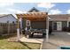 Outdoor living area with a pergola, patio furniture, and a view of the backyard at 160 Tracy Ridge Blvd, Whiteland, IN 46184