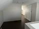 Attic room with wood flooring and white walls at 1624 S Jersey Ave, Muncie, IN 47302