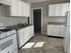 Kitchen with a double sink and plenty of cabinet space at 1624 S Jersey Ave, Muncie, IN 47302