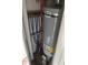 An A. O. Smith water heater with red and blue pipes at 1624 S Jersey Ave, Muncie, IN 47302