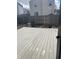 Backyard showcasing a wooden deck, a wooden fence and the layout of the outdoor space at 203 Village Green Dr, Indianapolis, IN 46227