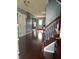 Traditional entryway with hardwood floors and stairs to the second floor at 203 Village Green Dr, Indianapolis, IN 46227