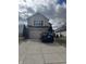 Two-story home featuring a two car garage, and a driveway with space for parking at 203 Village Green Dr, Indianapolis, IN 46227