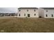 Expansive backyard with a large grass area, ideal for outdoor activities and relaxation at 215 Traditions Pass, Greenwood, IN 46143