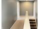 Carpeted hallway featuring access to multiple rooms at 215 Traditions Pass, Greenwood, IN 46143