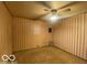 Bright bedroom featuring patterned wall paper and ample natural light at 2310 Mellen Rd, Indianapolis, IN 46231