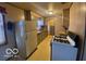Efficient kitchen featuring appliances and ample counter space for meal preparation at 2310 Mellen Rd, Indianapolis, IN 46231
