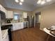 Well-lit kitchen with stainless steel appliances and bright cabinets at 2399 Orchard Creek Dr, Columbus, IN 47201