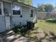 Side and back view of home with AC unit and siding at 2905 N Barr St, Muncie, IN 47303