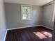 Bedroom featuring hard flooring, natural lighting and neutral walls at 2905 N Barr St, Muncie, IN 47303