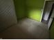 Unfurnished bedroom with green walls and carpet flooring at 326 W State Road 42, Mooresville, IN 46158