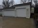 Detached garage with two car garage doors is displayed at 326 W State Road 42, Mooresville, IN 46158